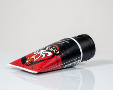 Cock Oil water based lube 2oz squeeze tube side view showing label