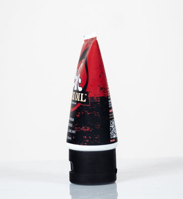 Cock Oil water based lube 2oz travel size in toiletry bag